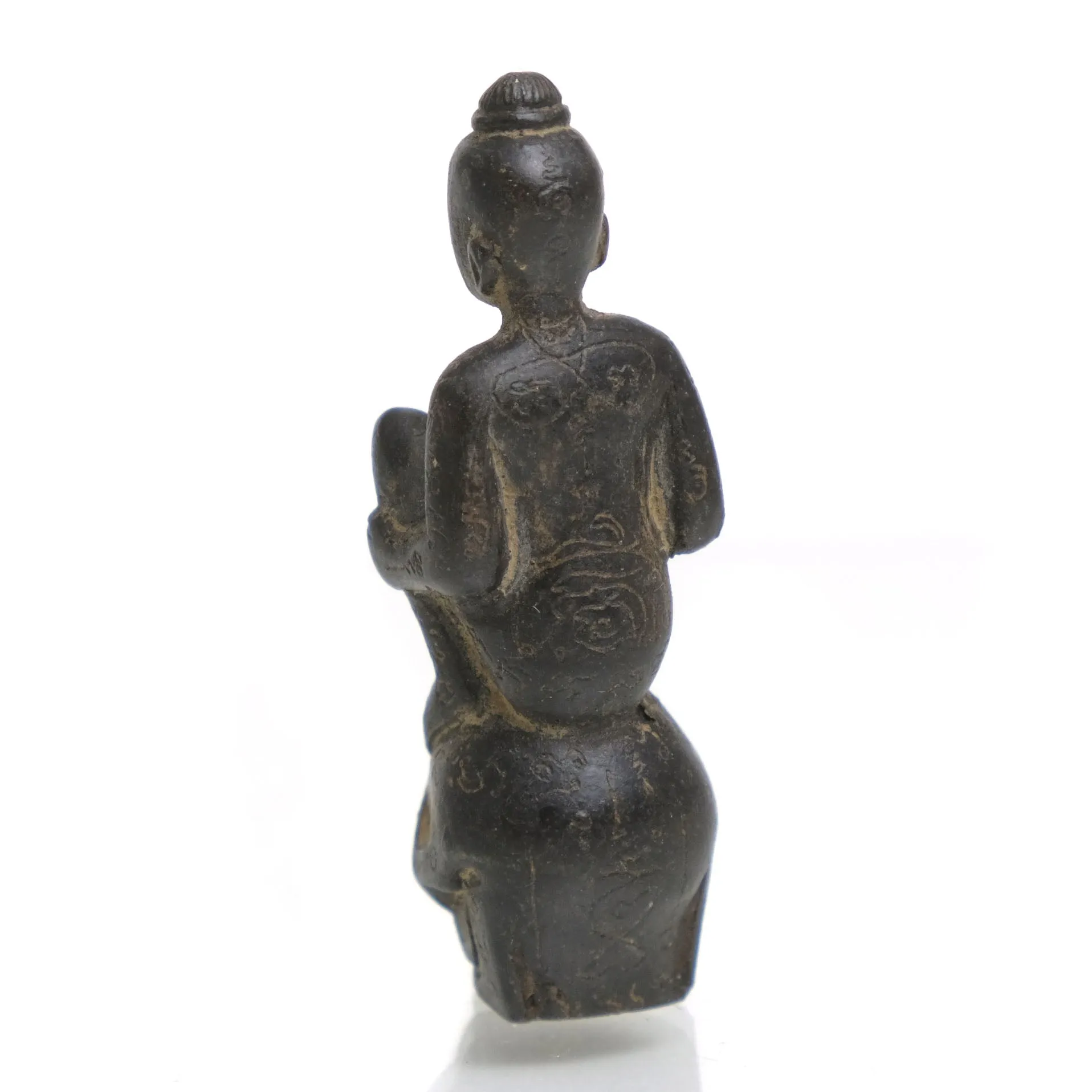 Kuman Thong Resting on a Skull Amulet