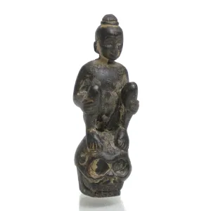 Kuman Thong Resting on a Skull Amulet